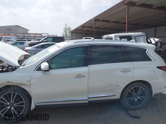 2017 Infiniti QX60 with VIN 5N1DL0MM7HC519011, listed as a IAAI auction lot 41804659 with 118,401 mi miles and . Bid and sale history available at DreamBid. Image 14.