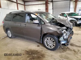2014 Toyota Sienna XLE with VIN 5TDYK3DC0ES501557, listed as a Copart auction lot 56290015 with Not Provided miles and Clean Title. Bid and sale history available at DreamBid. Image 4.