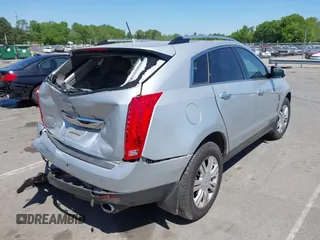 2011 Cadillac SRX Luxury Collection z VIN 3GYFNAEY9BS642724, wystawiony jako IAAI lot #42067396 z przebiegiem 177 473 mil mil oraz . Historia ofert i sprzedaży dostępna na DreamBid. Obrazek 4.