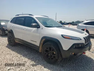 2016 Jeep Cherokee Trailhawk z VIN 1C4PJMBS3GW189266, wystawiony jako Copart lot #56891615 z przebiegiem 94 172 mil mil oraz Szkoda całkowita • Salvage title. Historia ofert i sprzedaży dostępna na DreamBid. Obrazek 4.