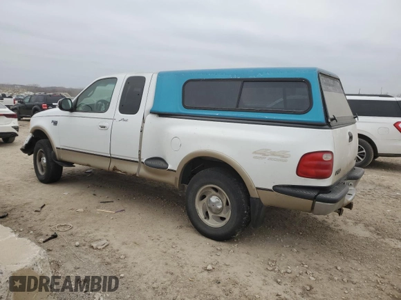2000 Ford F-150 XL with VIN 2FTRX08L0YCA70958, listed as a Copart auction lot 44517605 with 237,228 mi miles and Salvage title. Bid and sale history available at DreamBid. Image 2.