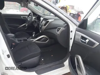2013 Hyundai Veloster w/Black Int with VIN KMHTC6AD9DU171722, listed as a IAAI auction lot 41617721 with 115,791 mi miles and . Bid and sale history available at DreamBid. Image 5.