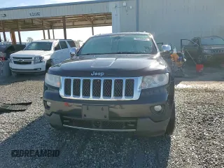 2013 Jeep Grand Cherokee Overland with VIN 1C4RJFCG2DC653207, listed as a Copart auction lot 48680885 with 276,020 mi miles and Salvage Title. Bid and sale history available at carsss.com. Image 14.