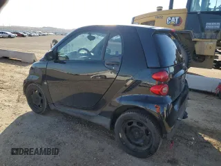 2009 Smart fortwo Pure with VIN WMEEJ31X89K287722, listed as a Copart auction lot 54266035 with 203,261 mi miles and Salvage Title. Bid and sale history available at carsss.com. Image 2.