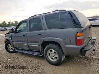 2002 Chevrolet Tahoe LT with VIN 1GNEC13Z22J139029, listed as a Copart auction lot 59149945 with 188,598 mi miles and Salvage title. Bid and sale history available at DreamBid. Image 2.