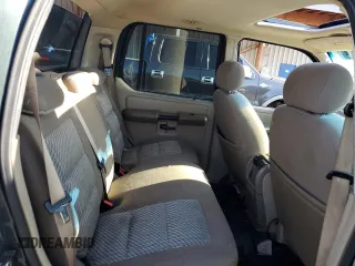 2004 Ford Explorer Sport Trac XLS z VIN 1FMDU77K04UB85358, wystawiony jako Copart lot #55636625 z przebiegiem 155 953 mil mil oraz Szkoda całkowita • Salvage title. Historia ofert i sprzedaży dostępna na DreamBid. Obrazek 10.