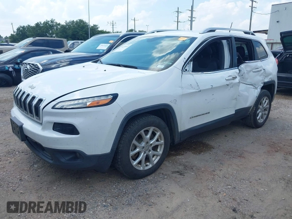 2018 Jeep Cherokee Latitude Plus with VIN 1C4PJLLBXJD590695, listed as a IAAI auction lot 39653845 with 76,667 mi miles and . Bid and sale history available at DreamBid. Image 17.