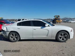 2014 Dodge Charger SXT with VIN 2C3CDXHG2EH104640, listed as a IAAI auction lot 41379760 with 122,664 mi miles and . Bid and sale history available at DreamBid. Image 13.