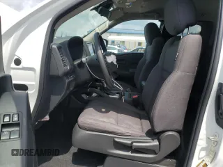 2023 Nissan Frontier S with VIN 1N6ED1CM1PN609767, listed as a Copart auction lot 64793675 with 36,700 mi miles and Salvage title. Bid and sale history available at DreamBid. Image 7.