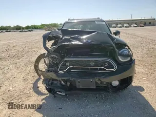 2017 MINI Countryman Cooper S z VIN WMZYT3C35H3D97994, wystawiony jako Copart lot #52289385 z przebiegiem 80 781 mil mil oraz Szkoda całkowita • Salvage title. Historia ofert i sprzedaży dostępna na DreamBid. Obrazek 10.