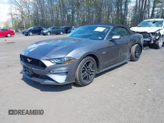 2023 Ford Mustang GT Premium with VIN 1FATP8FF9P5104802, listed as a IAAI auction lot 42033658 with 38,610 mi miles and . Bid and sale history available at carsss.com. Image 2.