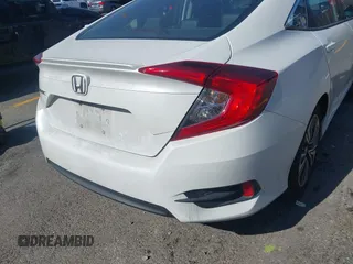 2016 Honda Civic EX-L with VIN 19XFC1F76GE200250, listed as a IAAI auction lot 42309545 with 91,589 mi miles and . Bid and sale history available at DreamBid. Image 4.
