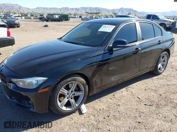 2012 BMW 3 Series 328i with VIN WBA3A5C58CF343636, listed as a IAAI auction lot 41832374 with 136,968 mi miles. Bid and sale history available at carsss.com. Image 2.