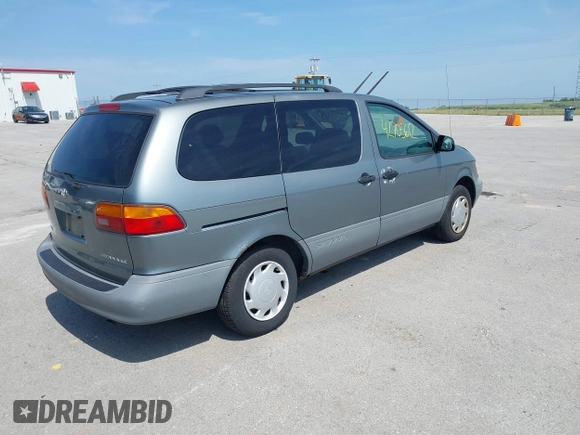 2000 Toyota Sienna LE with VIN 4T3ZF13C4YU211145, listed as a IAAI auction lot 42705612 with 217,825 mi miles and . Bid and sale history available at DreamBid. Image 4.