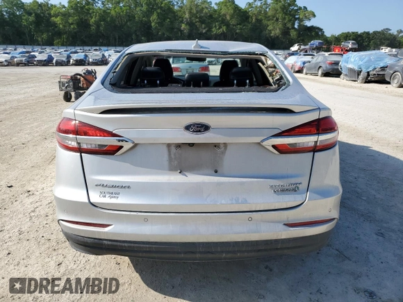 2019 Ford Fusion Titanium with VIN 3FA6P0RU1KR209297, listed as a Copart auction lot 54358065 with 122,600 mi miles and Salvage Title. Bid and sale history available at DreamBid. Image 6.
