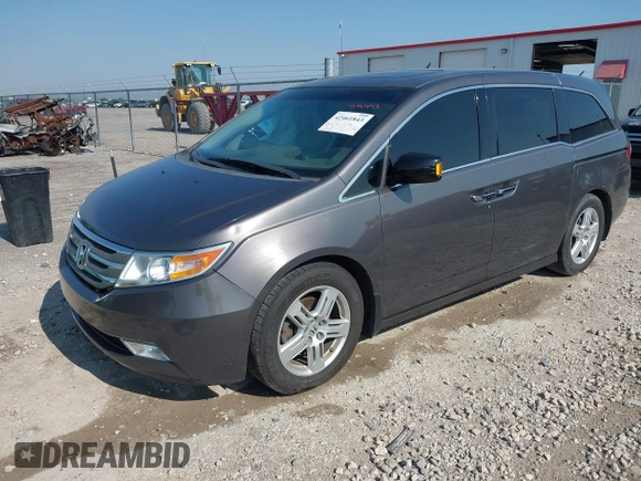 2013 Honda Odyssey Touring with VIN 5FNRL5H98DB080296, listed as a IAAI auction lot 42461843 with 104,901 mi miles and . Bid and sale history available at DreamBid. Image 17.