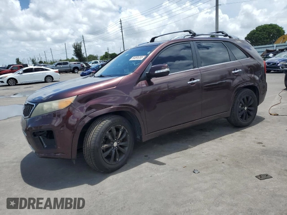 2012 Kia Sorento SX with VIN 5XYKW4A29CG308152, listed as a Copart auction lot 64895355 with 126,816 mi miles and Salvage title. Bid and sale history available at DreamBid. Image 1.