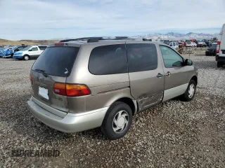 1999 Toyota Sienna LE with VIN 4T3ZF13C7XU133135, listed as a Copart auction lot 80618034 with 200,910 mi miles and Salvage Title. Bid and sale history available at carsss.com. Image 3.