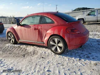 2012 Volkswagen Beetle 2.0T Turbo w/Sun/Sound with VIN 3VWV67AT4CM665309, listed as a Copart auction lot 88842565 with 160,998 mi miles and Salvage Title. Bid and sale history available at carsss.com. Image 2.