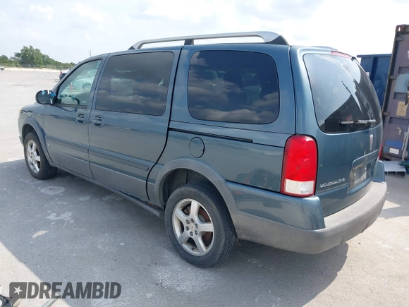 2006 Pontiac Montana SV6 with VIN 1GMDV33L66D211615, listed as a IAAI auction lot 42004609 with 264,541 mi miles. Bid and sale history available at carsss.com. Image 3.