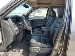 2013 Honda Ridgeline RTL with VIN 5FPYK1F51DB012680, listed as a Copart auction lot 50987085 with 63,372 mi miles and Salvage Title. Bid and sale history available at carsss.com. Image 7.