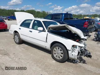 2003 Mercury Grand Marquis LS Premium with VIN 2MEFM75W53X699635, listed as a IAAI auction lot 42002694 with 154,781 mi miles and . Bid and sale history available at DreamBid. Image 1.