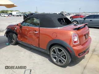 2014 MINI Roadster S z VIN WMWSY3C54ET595156, wystawiony jako Copart lot #68507474 z przebiegiem 43 608 mil mil oraz Tytuł czysty. Historia ofert i sprzedaży dostępna na DreamBid. Obrazek 2.