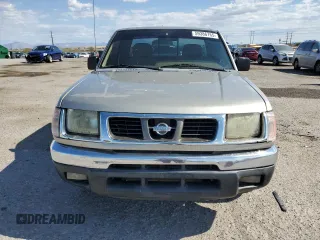 2000 Nissan Frontier XE with VIN 1N6DD26S7YC430643, listed as a Copart auction lot 59386765 with 204,851 mi miles and Salvage title. Bid and sale history available at DreamBid. Image 5.