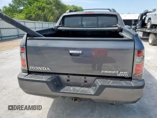 2014 Honda Ridgeline RTL z VIN 5FPYK1F53EB004694, wystawiony jako Copart lot #57222085 z przebiegiem 128 210 mil mil oraz Szkoda całkowita • Salvage title. Historia ofert i sprzedaży dostępna na DreamBid. Obrazek 6.