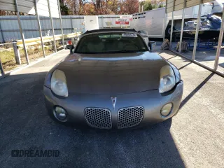 2006 Pontiac Solstice z VIN 1G2MB33BX6Y109591, wystawiony jako Copart lot #80684234 z przebiegiem 90 032 mil mil oraz Czysty tytuł • Clean title. Historia ofert i sprzedaży dostępna na DreamBid. Obrazek 5.
