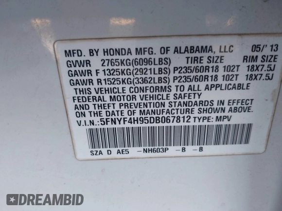2013 Honda Pilot Touring with VIN 5FNYF4H95DB067812, listed as a IAAI auction lot 40919050 with 256,087 mi miles. Bid and sale history available at carsss.com. Image 9.