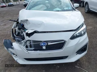 2019 Subaru Impreza Premium with VIN 4S3GTAC62K3704035, listed as a IAAI auction lot 42025822 with 76,067 mi miles and . Bid and sale history available at DreamBid. Image 12.
