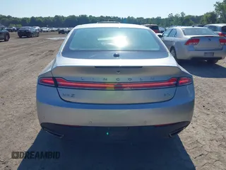 2014 Lincoln MKZ Hybrid with VIN 3LN6L2LU5ER822663, listed as a IAAI auction lot 42656735 with 122,025 mi miles and . Bid and sale history available at DreamBid. Image 16.