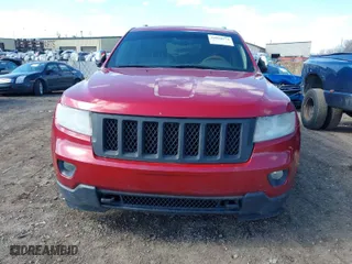 2011 Jeep Grand Cherokee Overland with VIN 1J4RR6GT9BC652336, listed as a IAAI auction lot 42028574 with 223,253 mi miles. Bid and sale history available at carsss.com. Image 13.