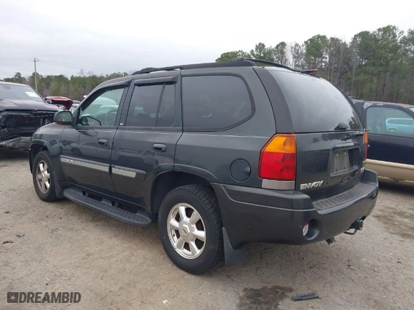 2004 GMC Envoy SLE with VIN 1GKDT13S642431159, listed as a IAAI auction lot 41511508 with 132,653 mi miles. Bid and sale history available at carsss.com. Image 3.