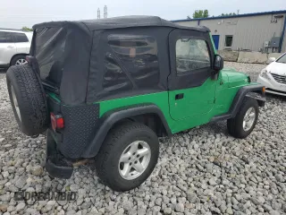 2004 Jeep Wrangler SE with VIN 1J4FA29124P769475, listed as a Copart auction lot 64371244 with 136,877 mi miles and Salvage title. Bid and sale history available at DreamBid. Image 3.