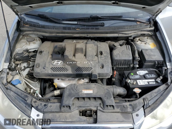 2007 Hyundai Elantra GLS z VIN KMHDU46D07U093432, wystawiony jako Copart lot #53382125 z przebiegiem 181 482 mil mil oraz Szkoda całkowita • Salvage title. Historia ofert i sprzedaży dostępna na DreamBid. Obrazek 11.