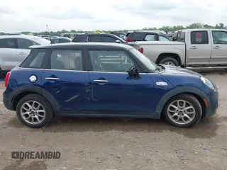 2017 MINI Hardtop 4 Door Cooper S z VIN WMWXU3C3XH2F49313, wystawiony jako IAAI lot #42137594 z przebiegiem 87 865 mil mil oraz . Historia ofert i sprzedaży dostępna na DreamBid. Obrazek 12.