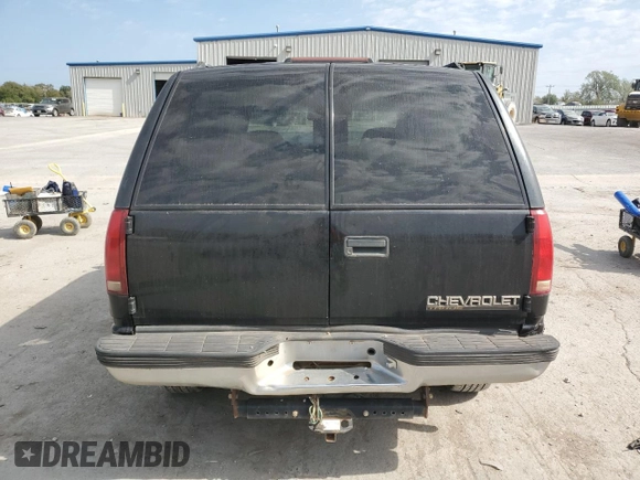 1999 Chevrolet Tahoe z VIN 3GNEC18R3XG165012, wystawiony jako Copart lot #75803204 z przebiegiem 227 608 mil mil oraz Szkoda całkowita • Salvage title. Historia ofert i sprzedaży dostępna na DreamBid. Obrazek 6.