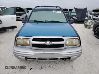 2002 Chevrolet Tracker LT with VIN 2CNBE634126928532, listed as a Copart auction lot 76990704 with Not provided miles and Salvage title. Bid and sale history available at DreamBid. Image 5.