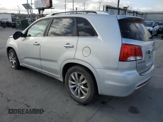 2012 Kia Sorento SX with VIN 5XYKWDA29CG302920, listed as a Copart auction lot 56237235 with 137,998 mi miles and Salvage title. Bid and sale history available at DreamBid. Image 2.