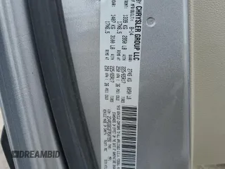 2015 Dodge Grand Caravan American Value with VIN 2C4RDGBG3FR507956, listed as a Copart auction lot 55948415 with 88,534 mi miles and Salvage Title. Bid and sale history available at DreamBid. Image 13.