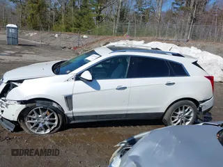 2014 Cadillac SRX Performance Collection with VIN 3GYFNFE30ES586713, listed as a IAAI auction lot 41791356 with 74,927 mi miles and . Bid and sale history available at DreamBid. Image 15.