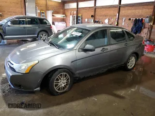 2010 Ford Focus SE with VIN 1FAHP3FN1AW146737, listed as a Copart auction lot 76261654 with 140,988 mi miles and Salvage Title. Bid and sale history available at DreamBid. Image 1.