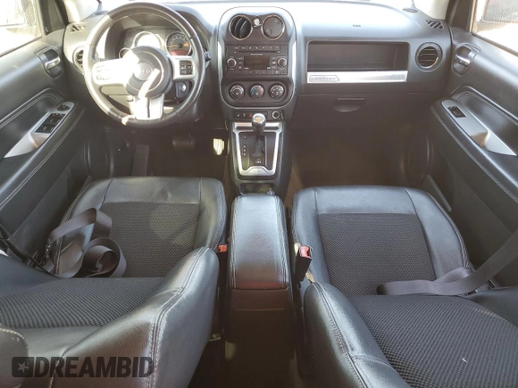 2016 Jeep Compass Latitude with VIN 1C4NJCEA8GD609149, listed as a Copart auction lot 46926795 with 111,997 mi miles and Salvage Title. Bid and sale history available at carsss.com. Image 8.