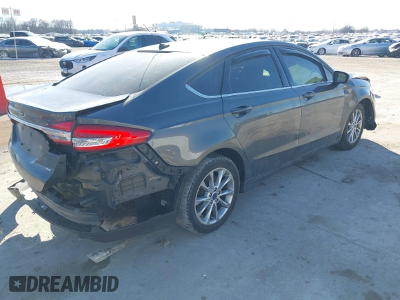 2017 Ford Fusion SE with VIN 3FA6P0H79HR398835, listed as a IAAI auction lot 41583142 with 162,707 mi miles. Bid and sale history available at carsss.com. Image 4.