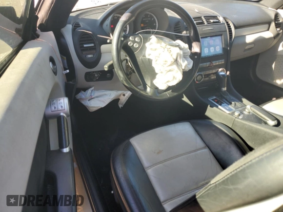 2006 Mercedes-Benz SLK-Class 5.5L AMG with VIN WDBWK73F86F086174, listed as a Copart auction lot 80097784 with 98,352 mi miles and Salvage Title. Bid and sale history available at carsss.com. Image 8.
