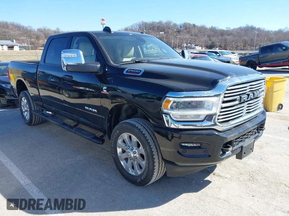 2023 Ram 2500 Laramie with VIN 3C6UR5FL5PG580770, listed as a IAAI auction lot 41734269 with 16,970 mi miles and . Bid and sale history available at DreamBid. Image 1.