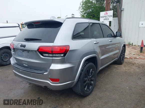 2017 Jeep Grand Cherokee Laredo with VIN 1C4RJEAG0HC702195, listed as a IAAI auction lot 42427597 with 104,403 mi miles and . Bid and sale history available at DreamBid. Image 4.