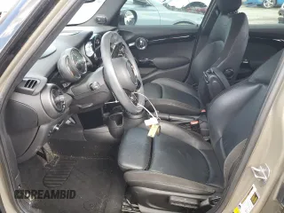 2020 MINI Hardtop 4 Door Cooper S z VIN WMWXU9C05L2L96631, wystawiony jako Copart lot #56916914 z przebiegiem 85 950 mil mil oraz Szkoda całkowita • Salvage title. Historia ofert i sprzedaży dostępna na DreamBid. Obrazek 7.